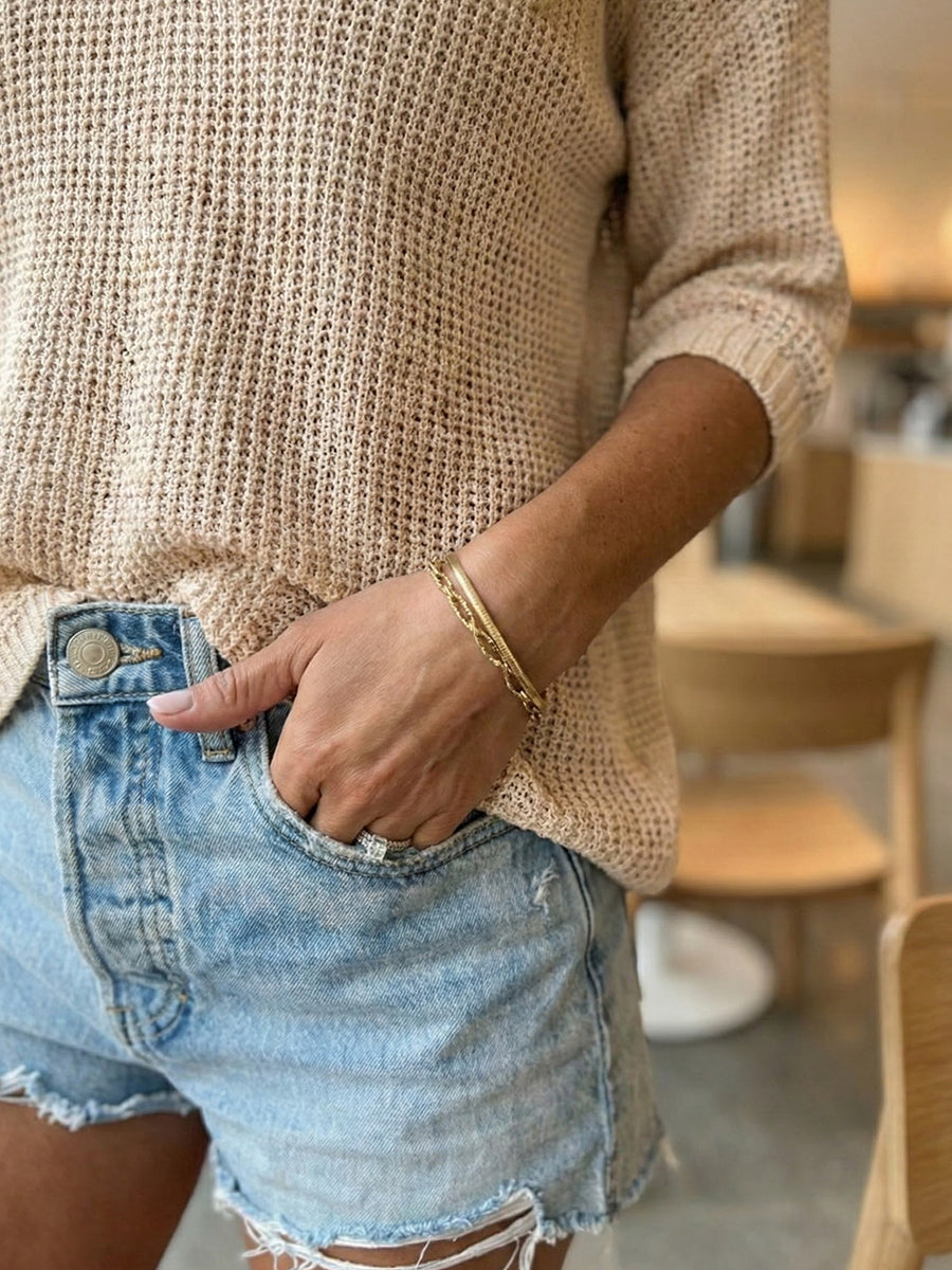 New women's collared knit sweater with three-quarter sleeves and solid color