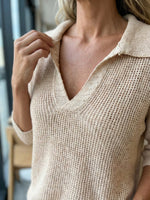 New women's collared knit sweater with three-quarter sleeves and solid color